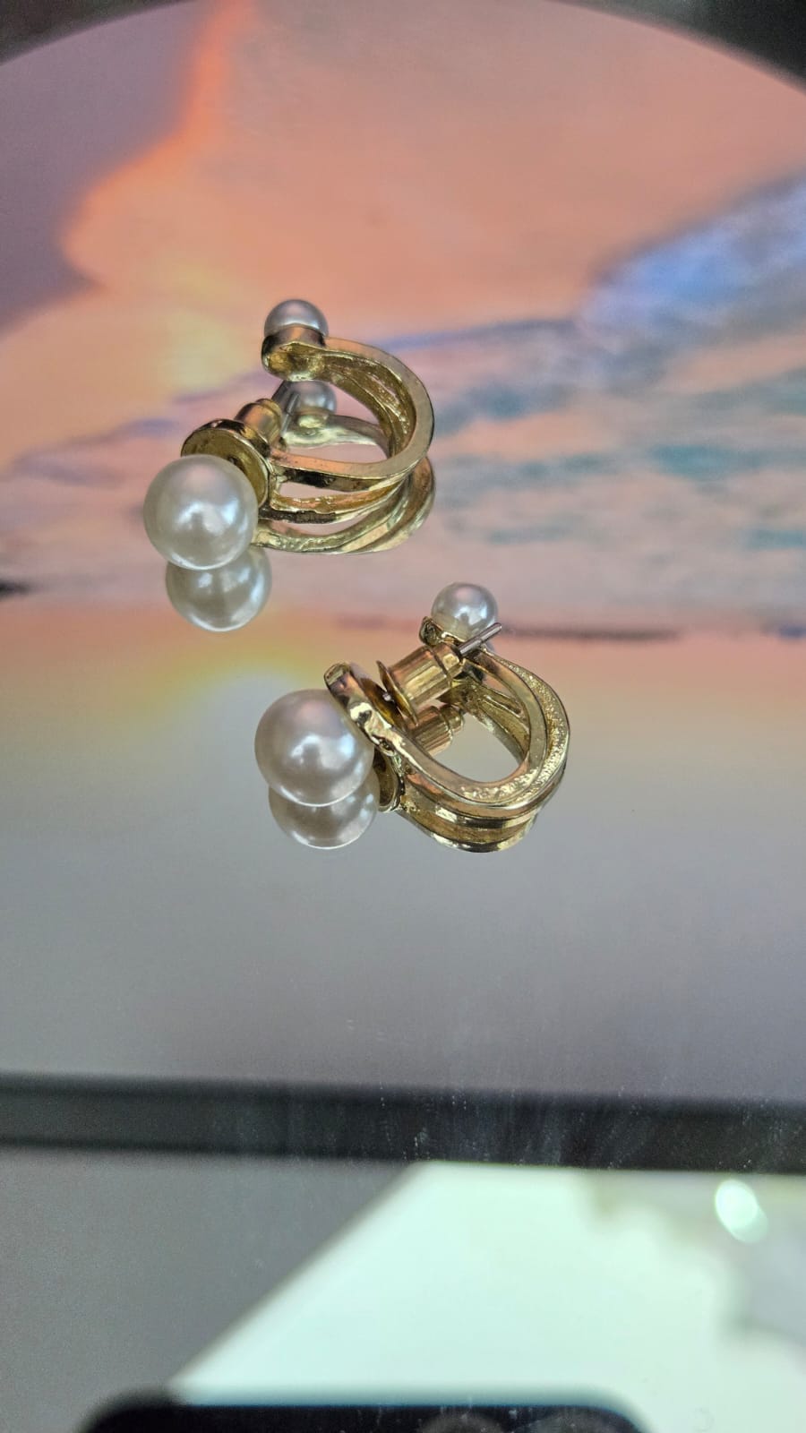 Earrings dangling