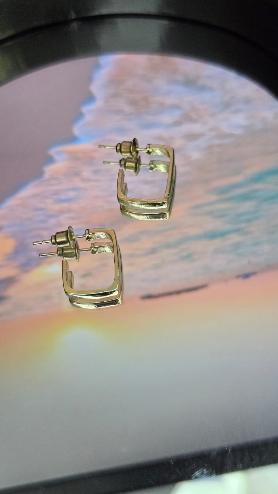 Earrings dangling